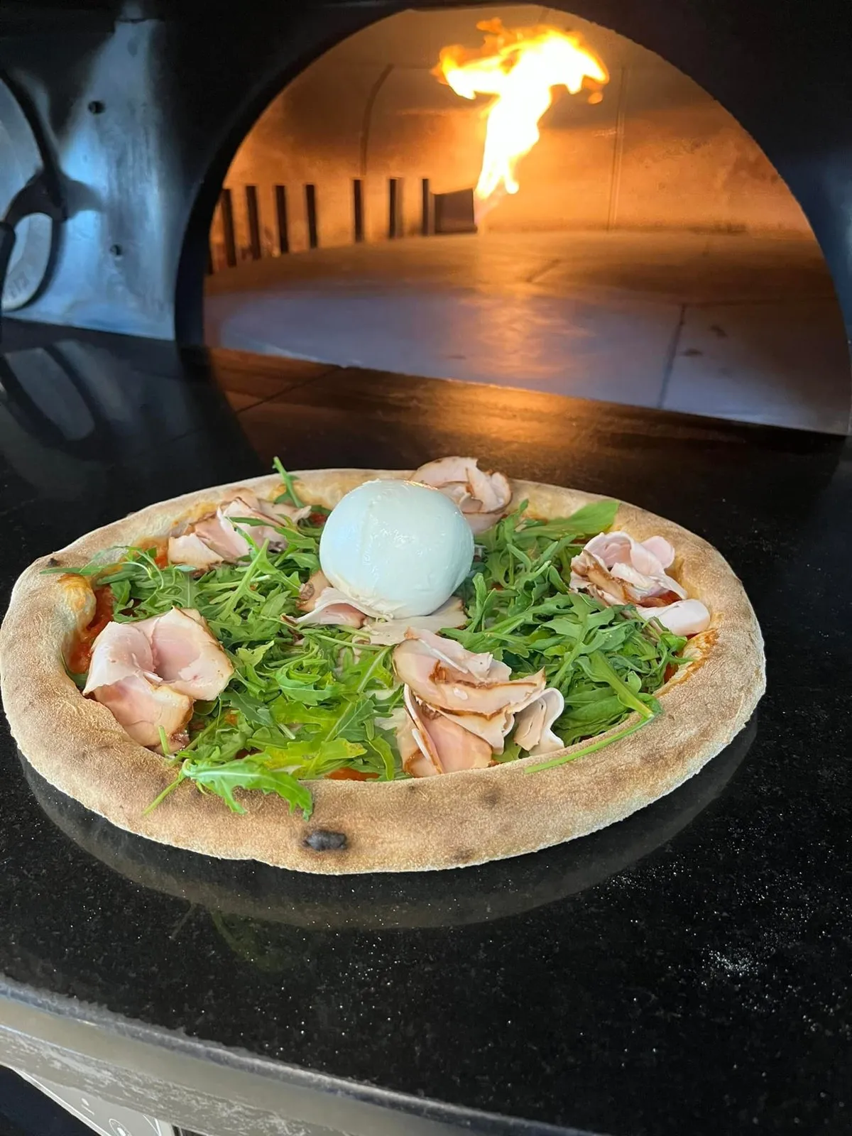 Pizza burrata rucola forno