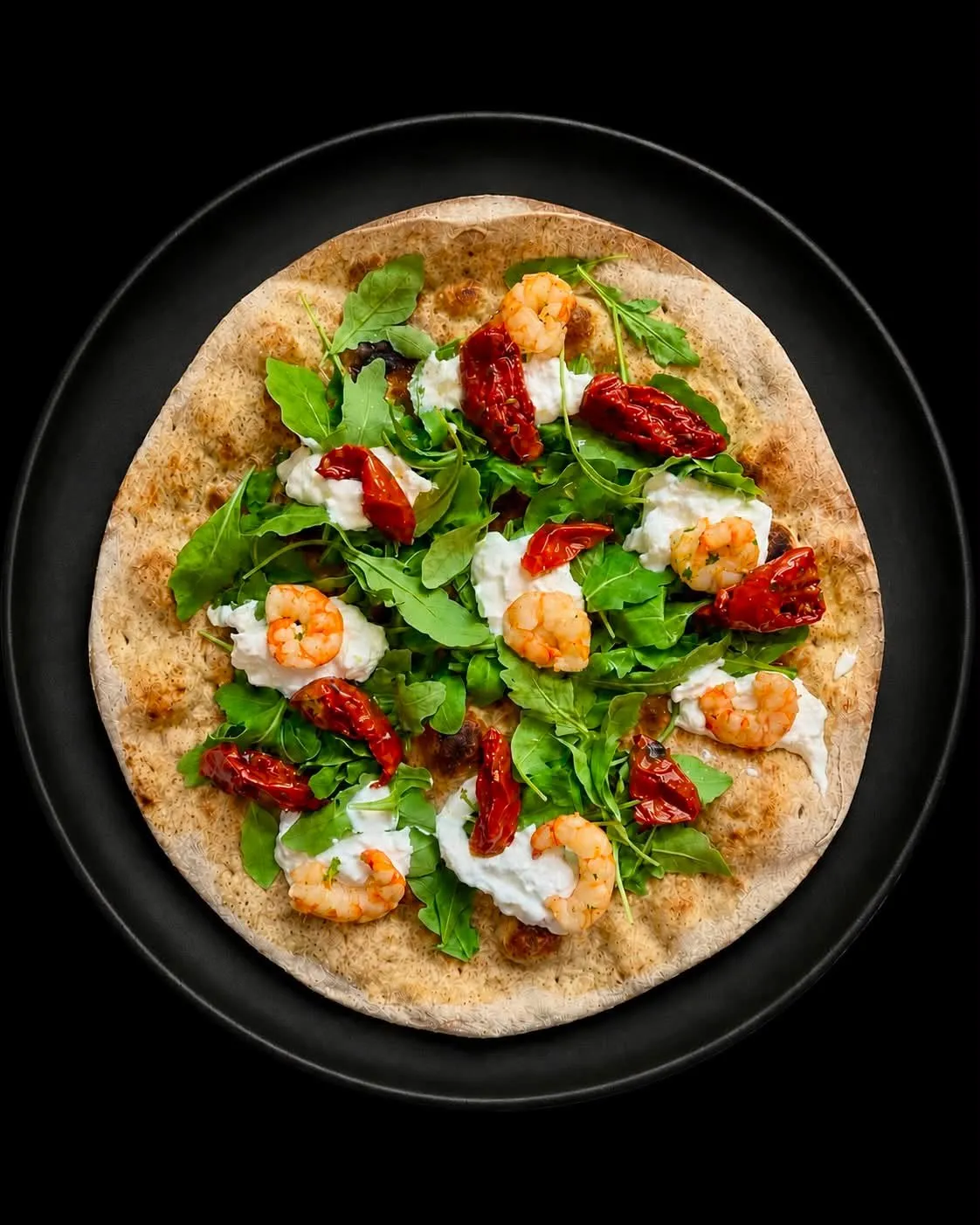 Pizza gamberi rucola pomodori secchi